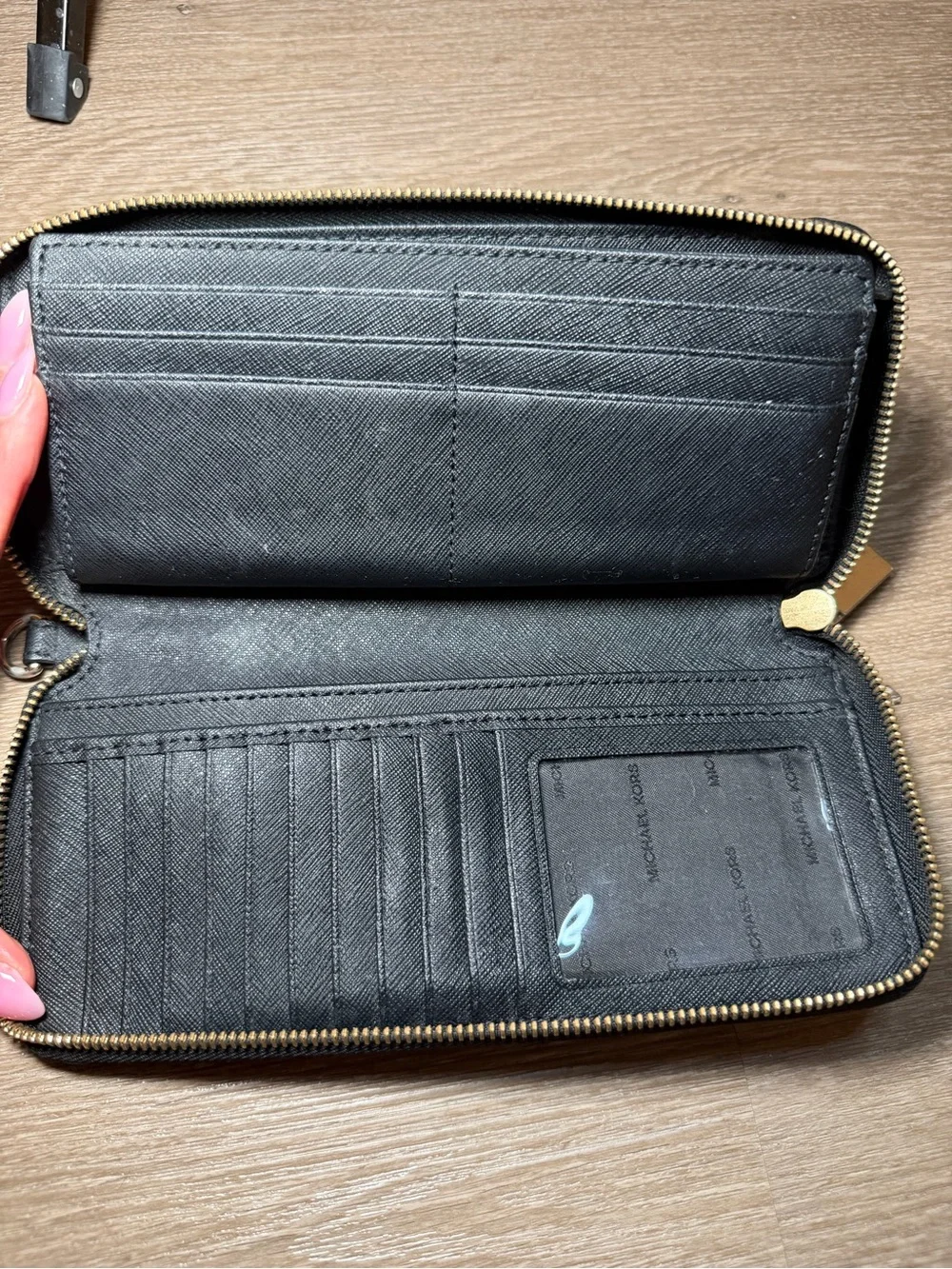 Michael Kors Black Zip-Around Saffiano Wallet with Gold Logo